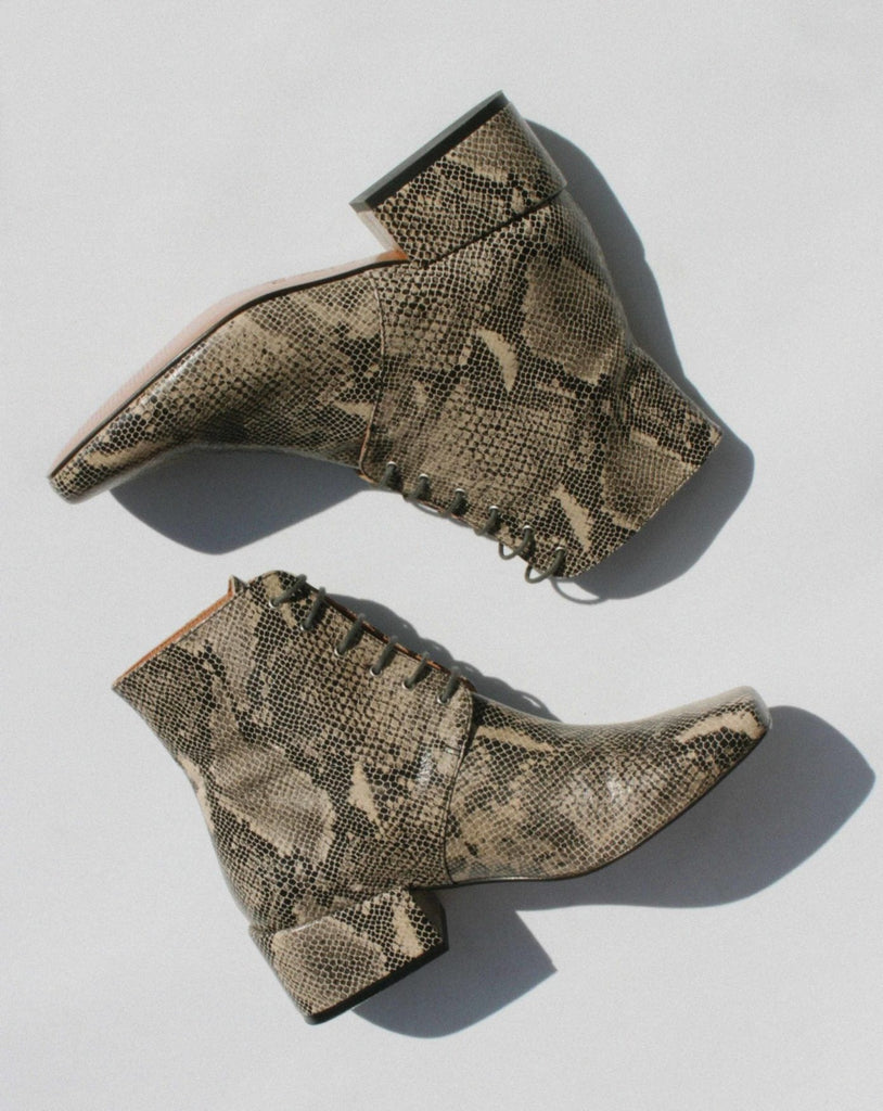 About Arienne GABRIEL snake skin lace up boot in White Mamba. Available at EASE Toronto.