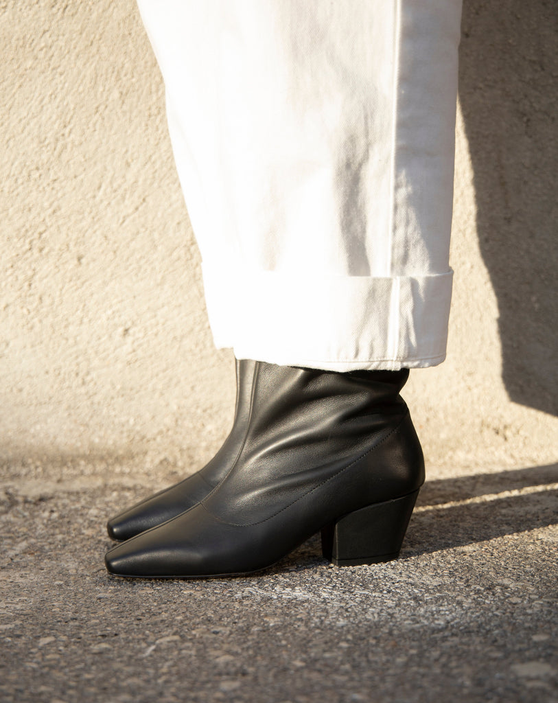 About Arienne UMA high leather boot in Black. Available at EASE Toronto.
