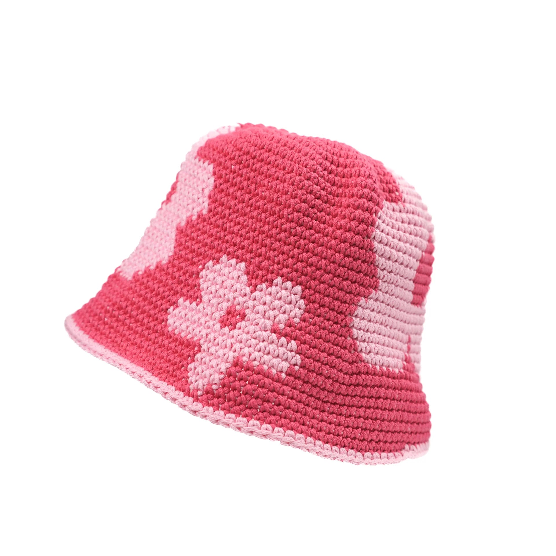 Crochet monochromatic pink bucket hat with graphic floral pattern available at Ease Toronto