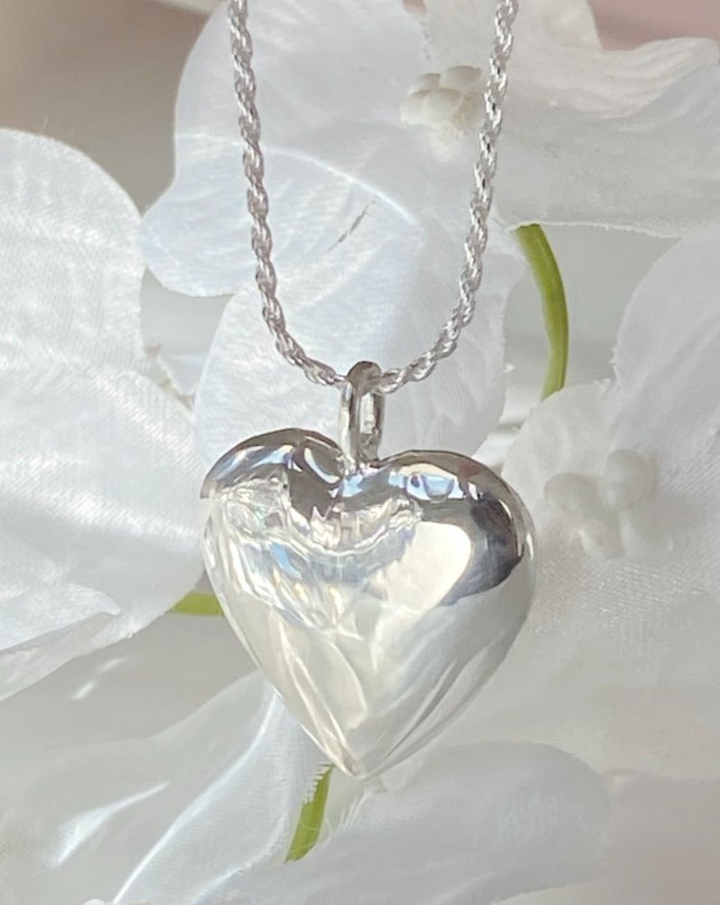 Sterling silver rope necklace with silver one inch puffy heart pendant 