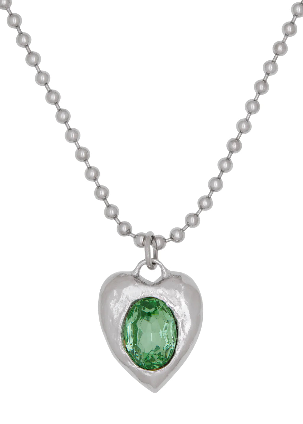 Silver-tone heart necklace set with clear glass stone on ball chain.