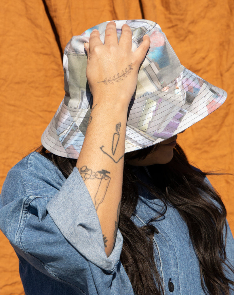 CLYDE X Maya Beaudry Collaboration patterned bucket hat 100% cotton. Available at Ease Toronto