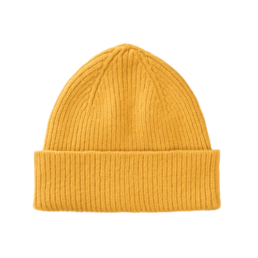 Wool and Caregora Bonnet Beanie in Mustard. Available at EASE Toronto. 