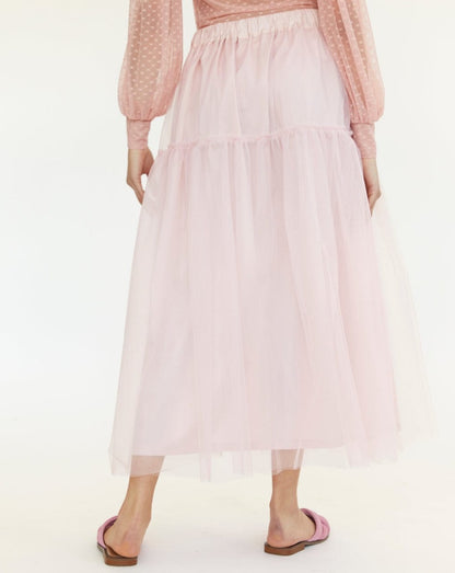 Ballet pink tulle skirt. Made up of two floating tulle  layers, the Tilly skirt has two tiers of gathered tulle, a stretchy elastic waistband, and is lined with a sturdy and soft cotton.  