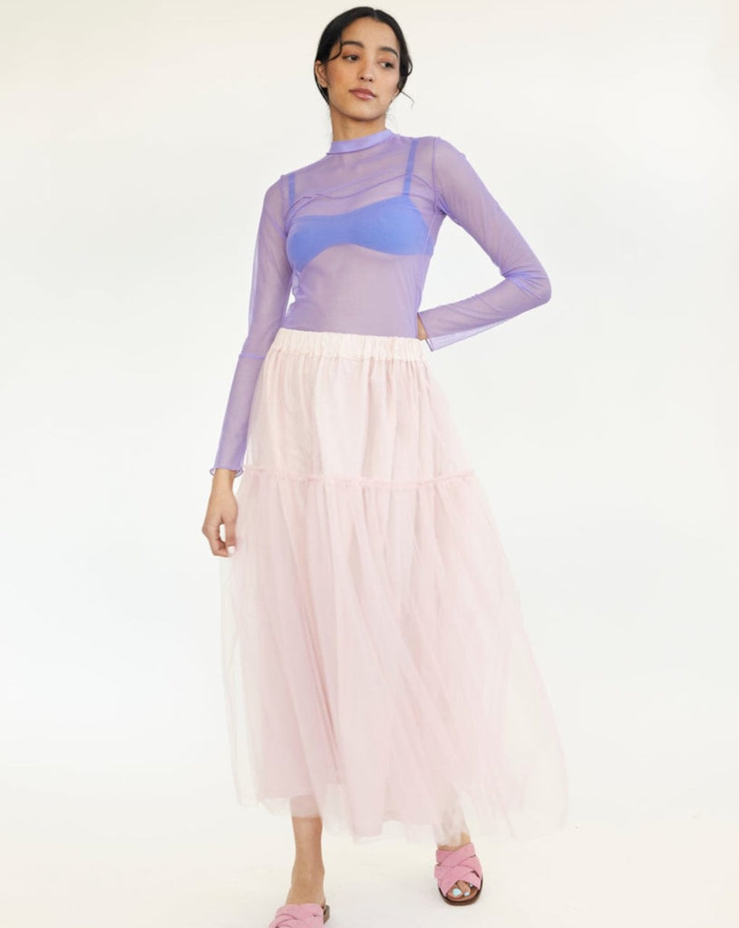 Ballet pink tulle skirt. Made up of two floating tulle  layers, the Tilly skirt has two tiers of gathered tulle, a stretchy elastic waistband, and is lined with a sturdy and soft cotton.  