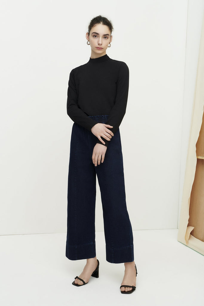 Kowtow High Neck Top in Black. Available at EASE Toronto.