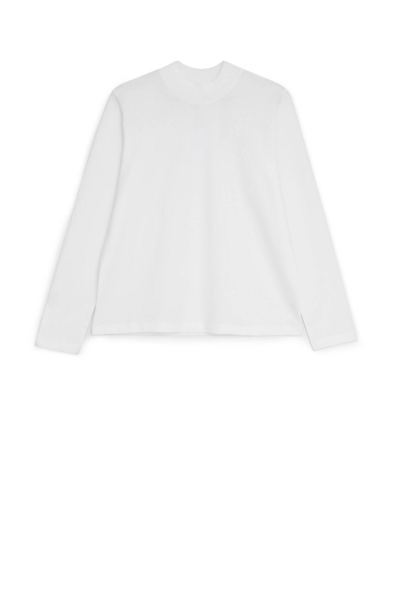Kowtow High Neck Top in White. Available at EASE Toronto.