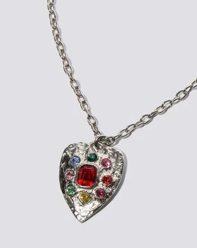 Silver-tone heart necklace with glass and crystal stones on cable chain. Charm Length: 1.5"