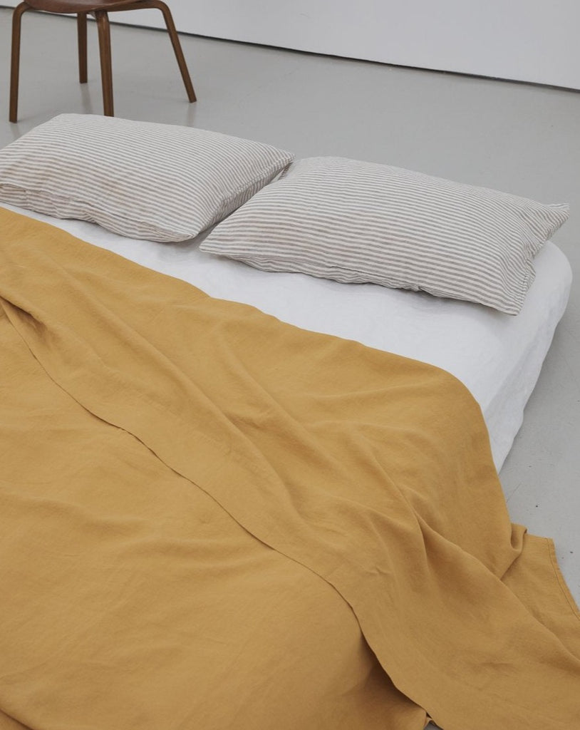 Deiji Studios Sheet in Mustard. Available at EASE Toronto.