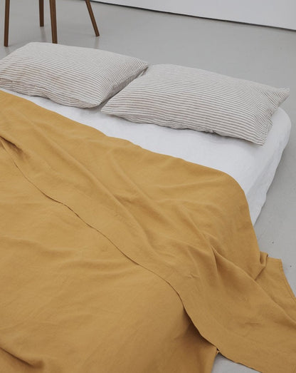 Deiji Studios Sheet in Mustard. Available at EASE Toronto.