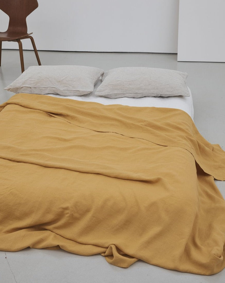 Deiji Studios Sheet in Mustard. Available at EASE Toronto.