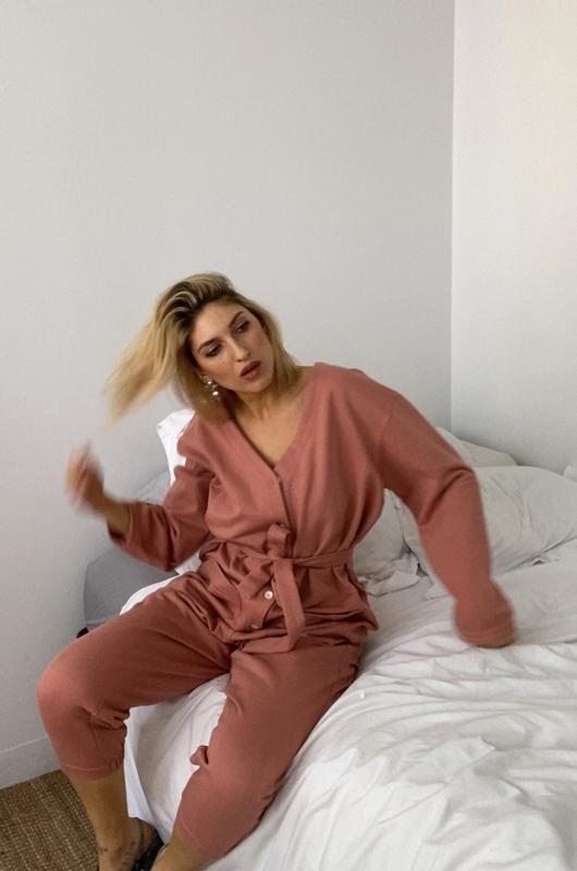 In Soft Focus Jogger Jumpsuit in Baked Coral. Available at EASE Toronto.