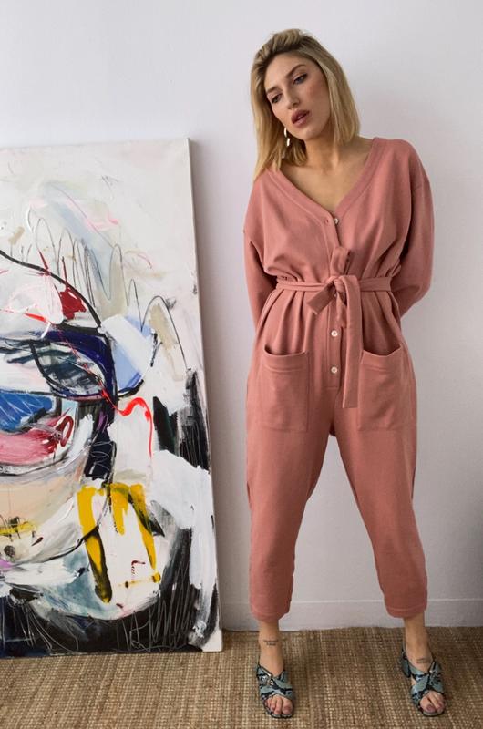 In Soft Focus Jogger Jumpsuit in Baked Coral. Available at EASE Toronto.